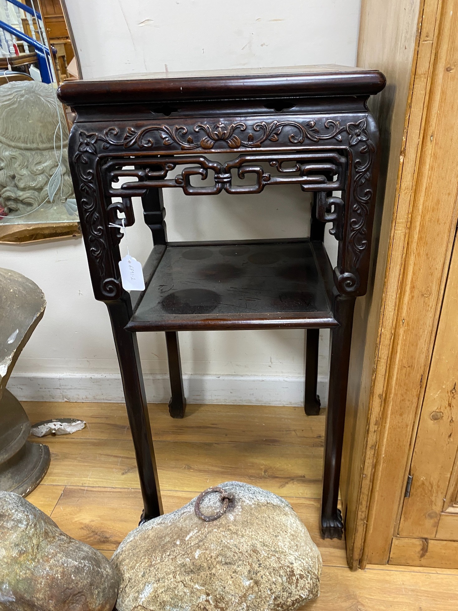 A 19th century Chinese marble inset hardwood jardiniere stand, width 42cm, height 87cm